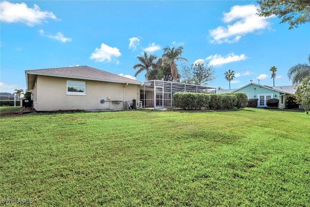 view of yard featuring a lanai