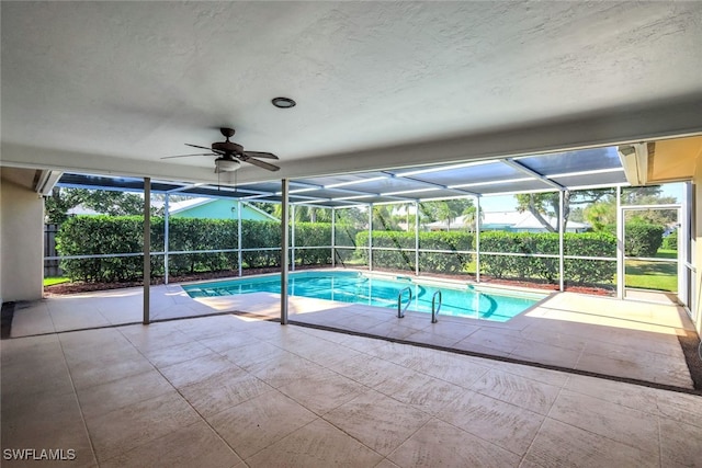 view of pool featuring a patio, a fenced backyard, a lanai, a ceiling fan, and a fenced in pool