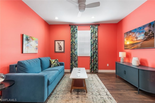 living area with dark wood-style floors, recessed lighting, a ceiling fan, and baseboards