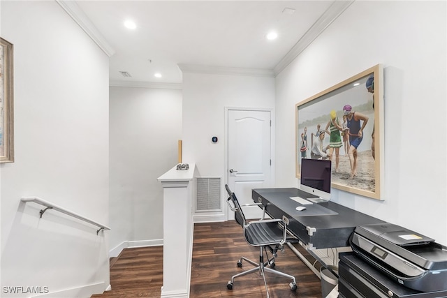 office area with dark wood finished floors, visible vents, crown molding, and baseboards