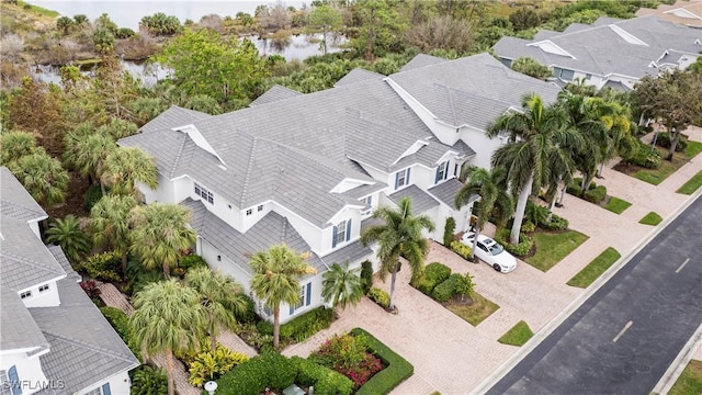 bird's eye view with a water view and a residential view