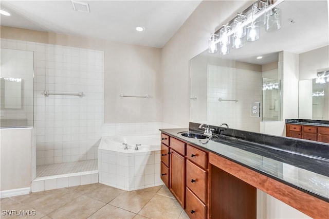 full bath featuring visible vents, a garden tub, tile patterned flooring, walk in shower, and vanity