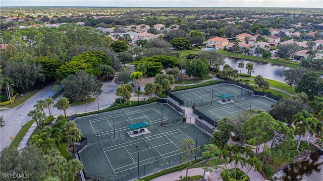 aerial view featuring a residential view and a water view