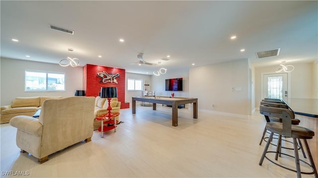 rec room with a wealth of natural light, visible vents, and recessed lighting