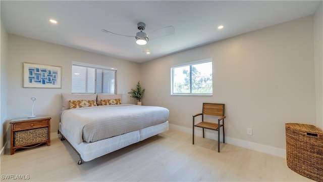 bedroom featuring light wood finished floors, ceiling fan, baseboards, and recessed lighting