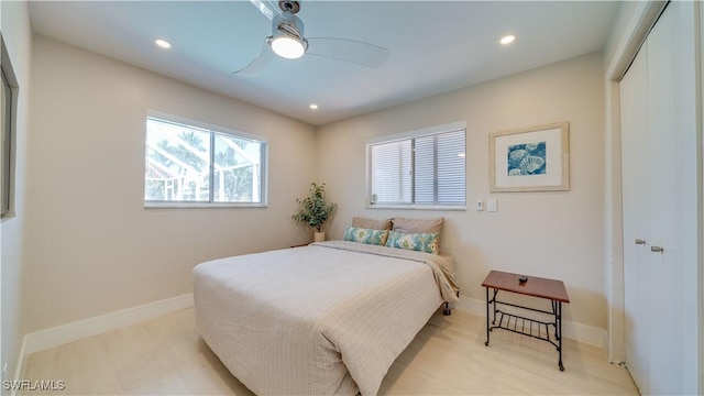 bedroom with a ceiling fan, recessed lighting, a closet, and baseboards