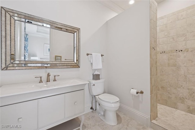 full bath with marble finish floor, toilet, vanity, baseboards, and walk in shower