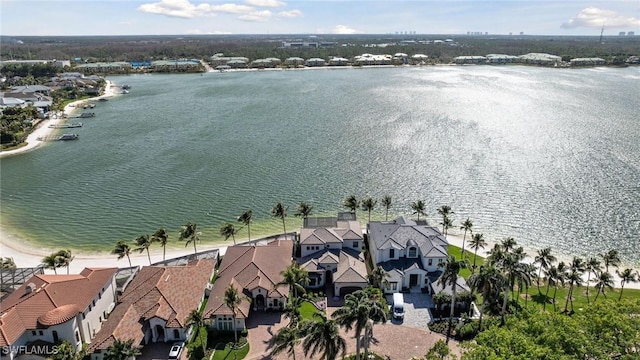 bird's eye view with a residential view and a water view