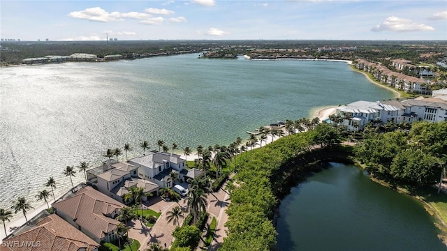 birds eye view of property featuring a water view and a residential view