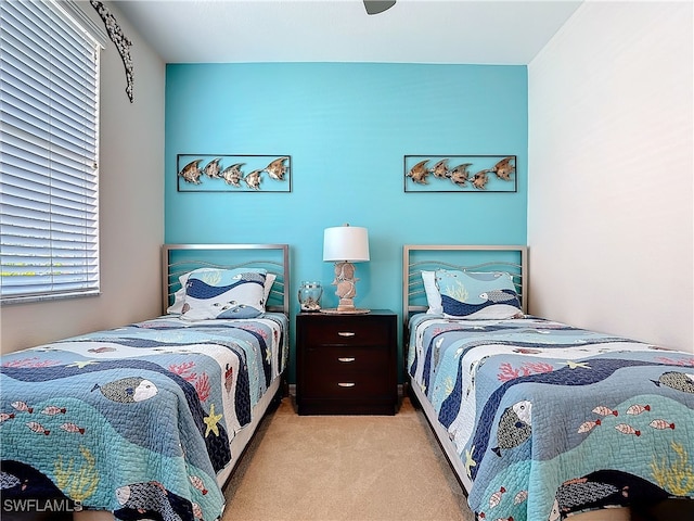 bedroom with light colored carpet