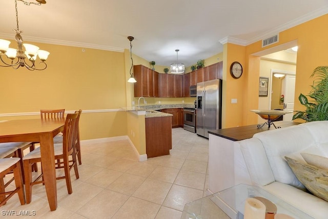 kitchen featuring light tile patterned flooring, a peninsula, visible vents, appliances with stainless steel finishes, and crown molding