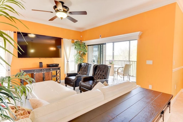 living area with ornamental molding and ceiling fan