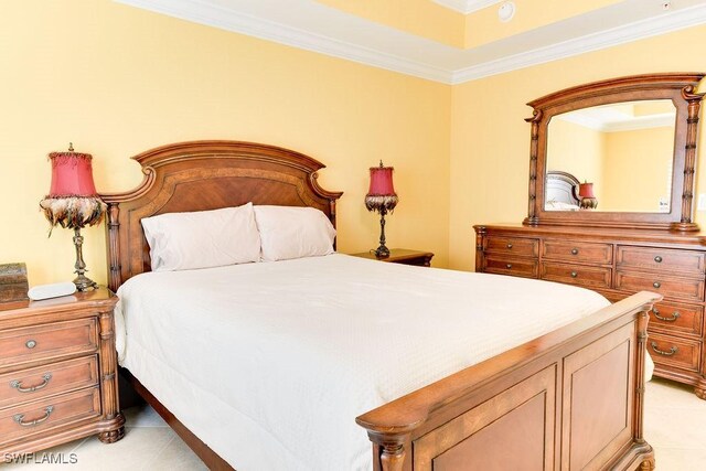 bedroom with ornamental molding