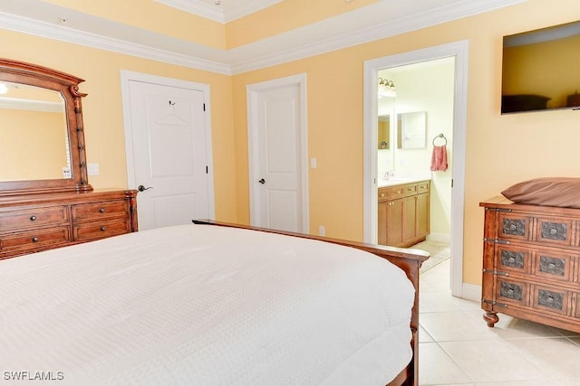 bedroom featuring light tile patterned floors, baseboards, connected bathroom, crown molding, and a sink