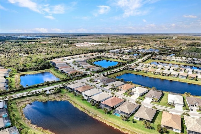 bird's eye view with a water view and a residential view