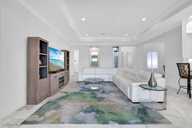 living room with crown molding, baseboards, a raised ceiling, and recessed lighting