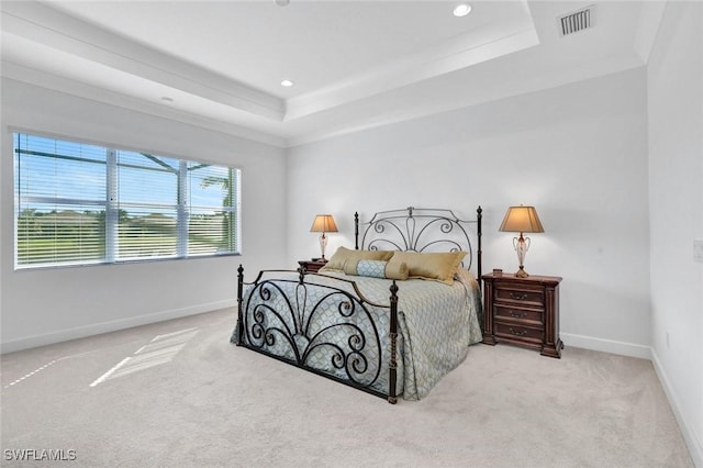 bedroom with recessed lighting, carpet flooring, visible vents, baseboards, and a raised ceiling