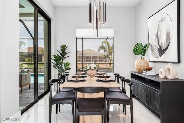 dining room with marble finish floor