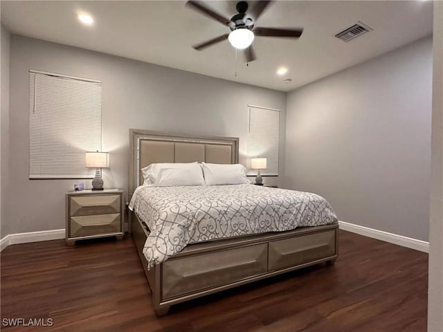 bedroom featuring recessed lighting, dark wood-style flooring, visible vents, and baseboards