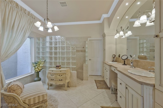 full bath featuring visible vents, an inviting chandelier, ornamental molding, a sink, and tile patterned floors