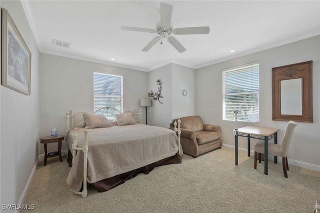 bedroom featuring multiple windows, visible vents, and crown molding