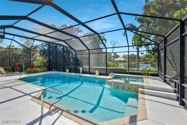 view of pool with a patio area, a water view, a lanai, and a pool with connected hot tub