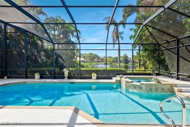 view of swimming pool with a lanai, a pool with connected hot tub, and a patio