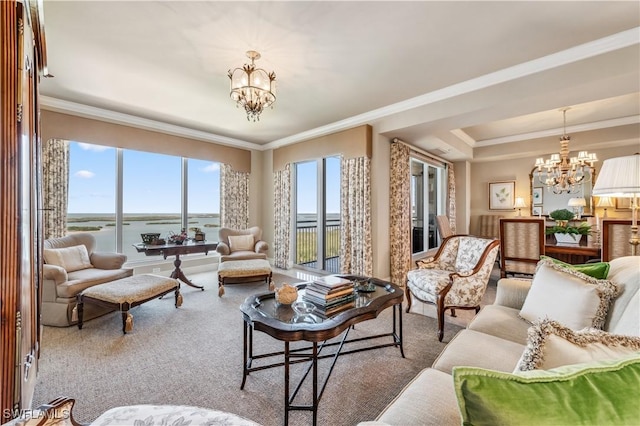 living room with crown molding, carpet floors, and a notable chandelier