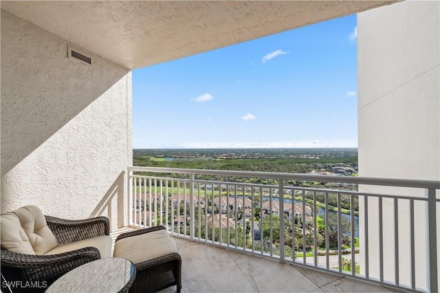 balcony featuring visible vents