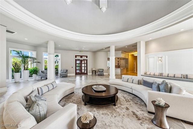 interior space featuring a tray ceiling, french doors, decorative columns, recessed lighting, and visible vents