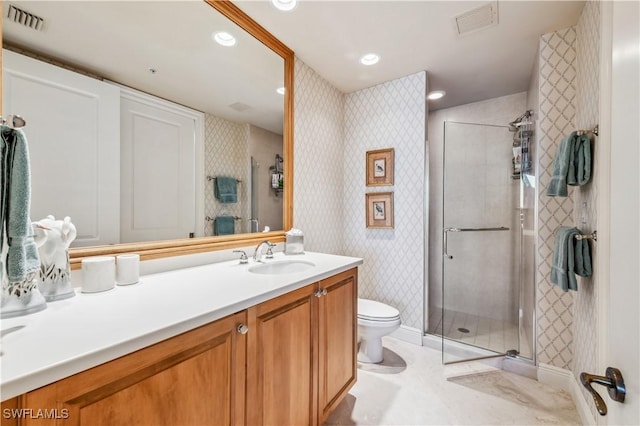 full bath with a stall shower, visible vents, vanity, and wallpapered walls