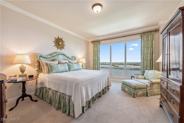 carpeted bedroom with ornamental molding, a water view, and baseboards