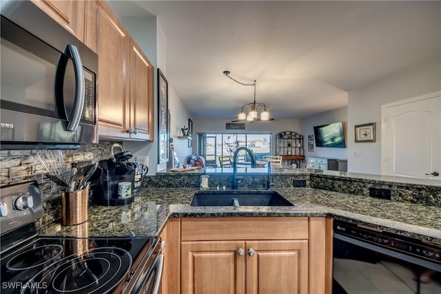 kitchen with black dishwasher, dark stone counters, electric stove, an inviting chandelier, and a sink