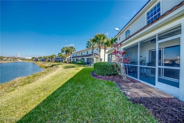 view of yard with a water view