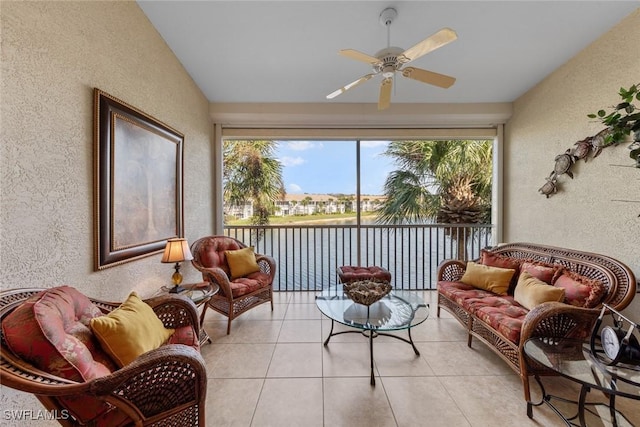 sunroom featuring ceiling fan