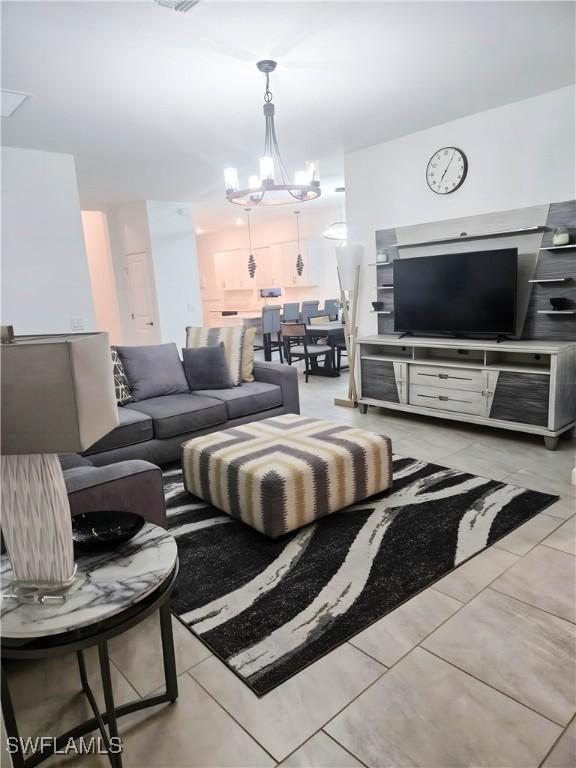 18297 Ridgeline Dr, Estero, FL 33928 - living area featuring a chandelier