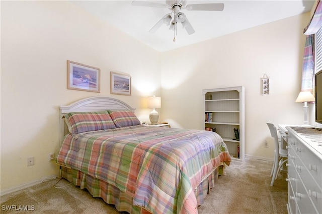 bedroom with carpet floors, a ceiling fan, and baseboards