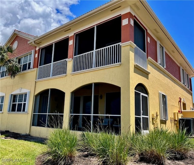 view of property with central air condition unit