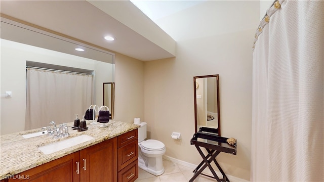 bathroom with toilet, recessed lighting, vanity, baseboards, and tile patterned floors