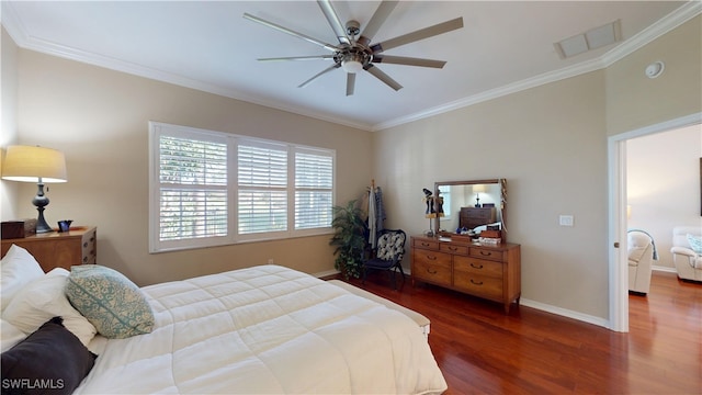 bedroom featuring crown molding, visible vents, dark wood-type flooring, ceiling fan, and baseboards