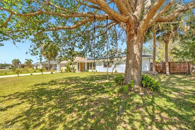 view of yard featuring fence