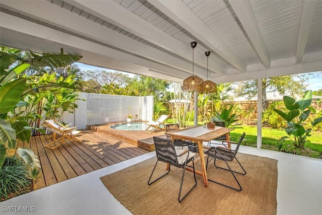 wooden deck featuring a fenced in pool, outdoor dining area, and a fenced backyard