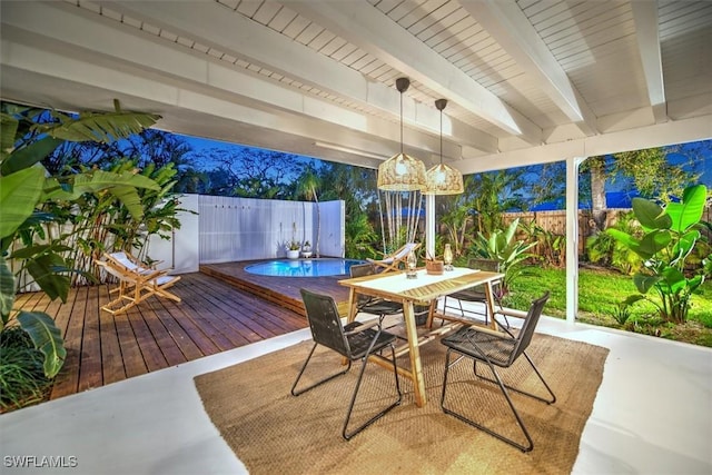 sunroom / solarium with beamed ceiling