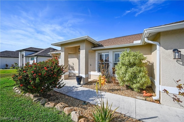 view of front of house with stucco siding