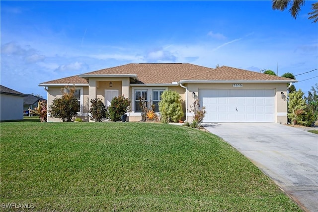 view of front of house with an attached garage, a front yard, and stucco siding