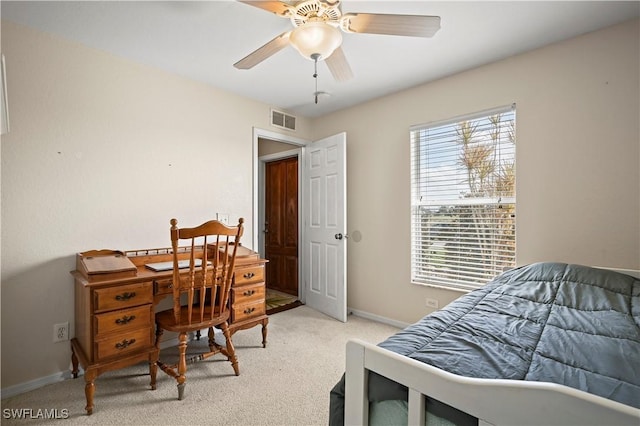 bedroom featuring light colored carpet, visible vents, ceiling fan, and baseboards