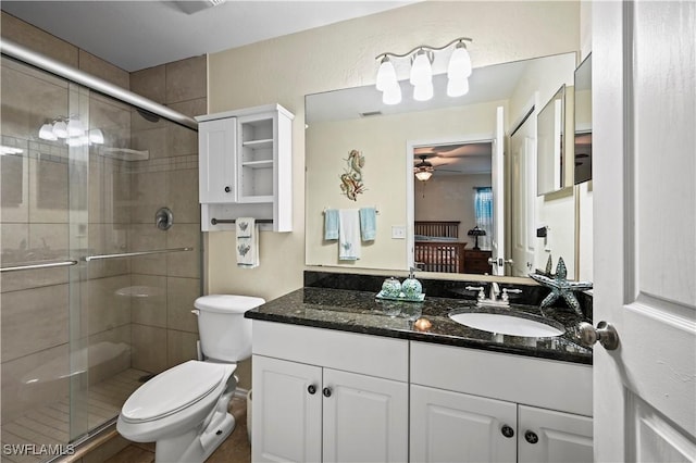 ensuite bathroom featuring connected bathroom, toilet, visible vents, vanity, and a shower stall