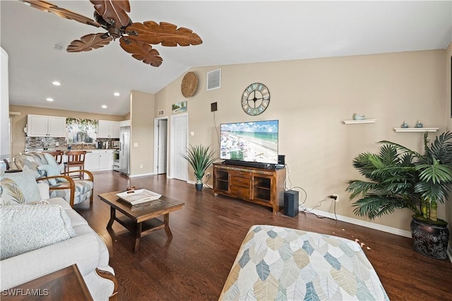 living room with baseboards, a ceiling fan, lofted ceiling, dark wood-style floors, and recessed lighting