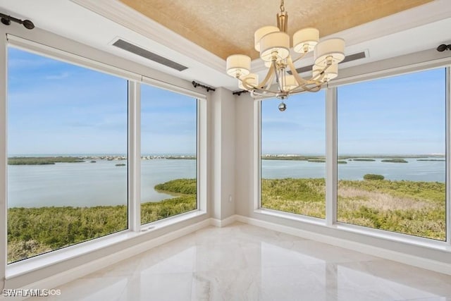 unfurnished sunroom featuring a chandelier, a water view, and visible vents