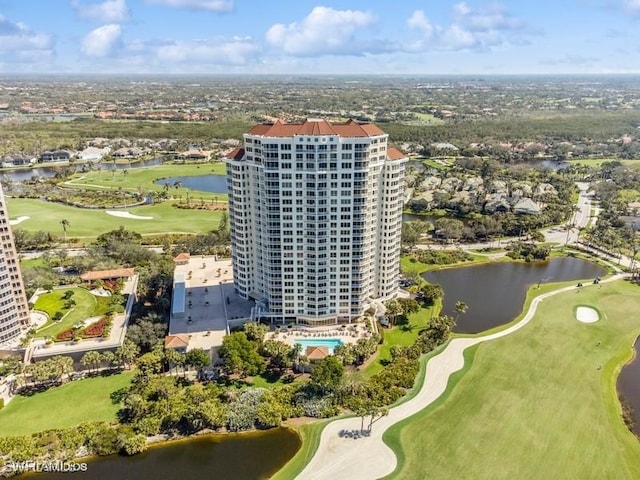 bird's eye view with view of golf course, a water view, and a view of city